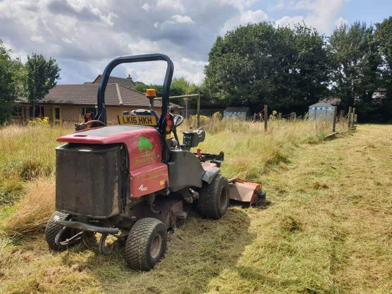 mower tidying up playground