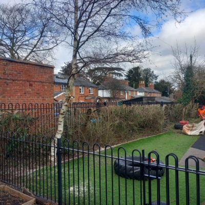 landscaper cleaning finished playground